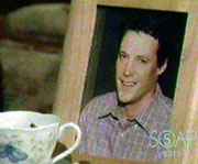 04Ep020E2: Jennifer puts a cup of tea by Jack's photo